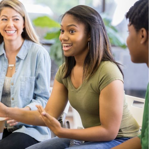 A therapist practices dialectical behavioral therapy with her client.