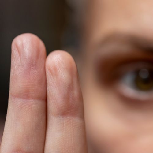 Up-close of a therapist's fingers.